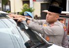 Berbagi-Takjil-Jelang-Buka-Puasa,-Polres-Madiun-Kota-Sosialisasikan-Hotline-110-untuk-Mudik-Lebaran