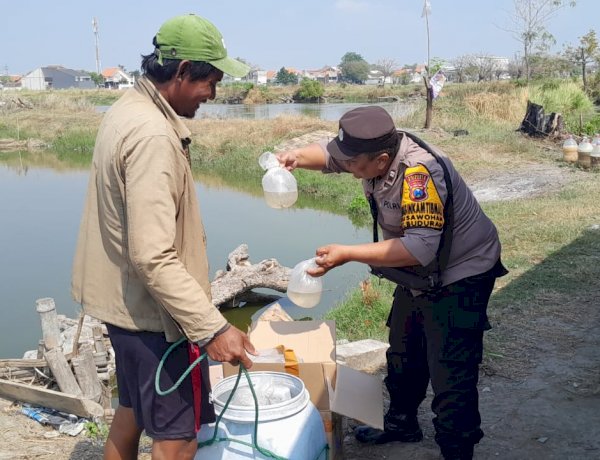 Bhabinkamtibmas Polsek Buduran Sambangi Warga Desa Sawohan, Dorong Ketahanan Pangan melalui Budidaya Ikan Bandeng